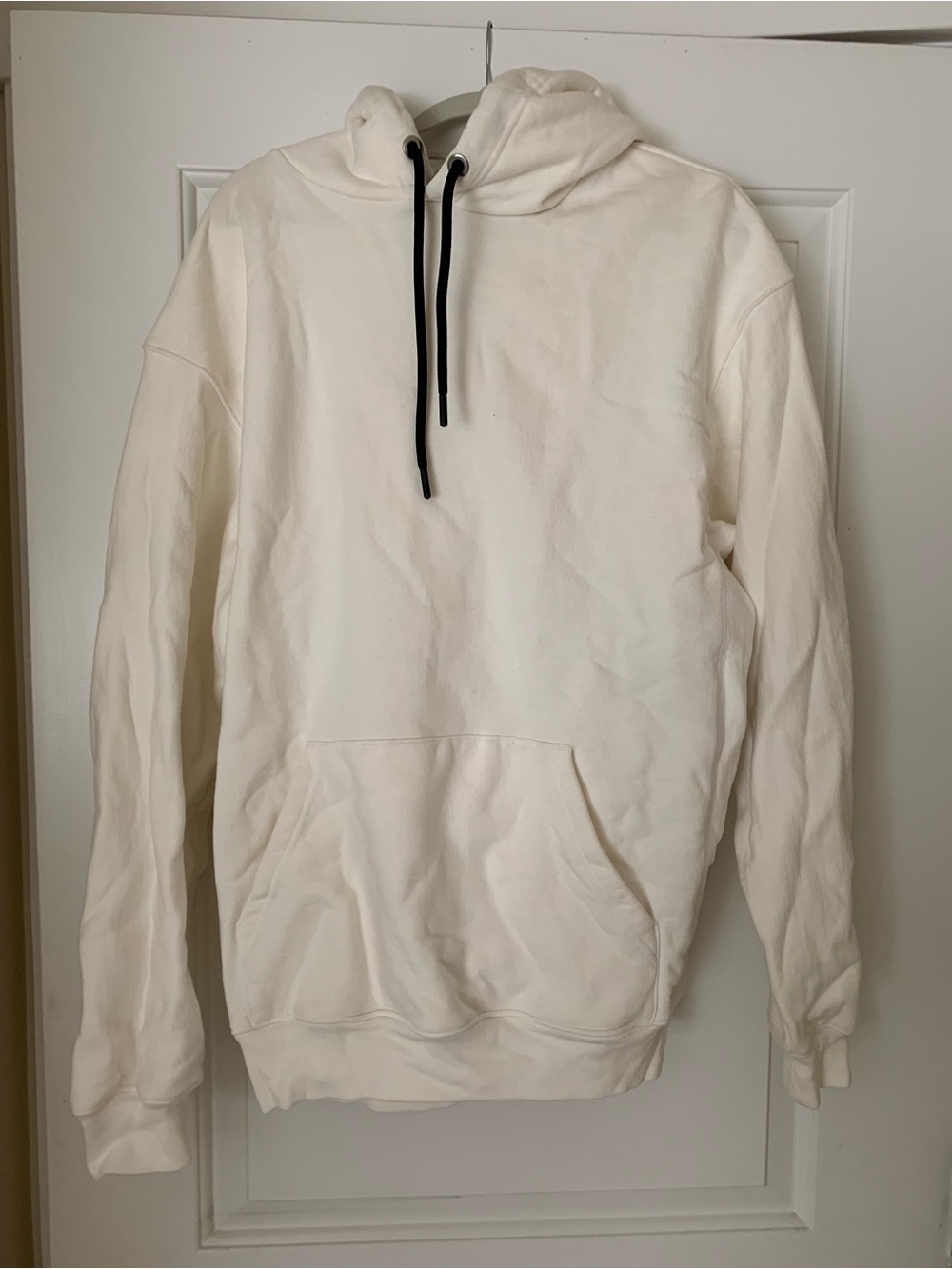 Reebok Cream Hoodie with Black Drawstrings
